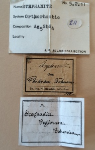 Labels for the Pribram stephanite.  Only the last label is recognizable to me - Rukin Jelks (who was a very highly regarded southern Arizona collector).