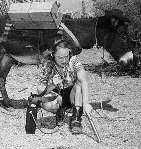 When rock blooms yellow and Geiger counters rattle - uranium! From a National Geographic Society publication, 1953