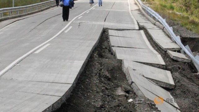a-damaged-road-is-seen-after-a-quake-at-tarahuin-is-the-chiloe
